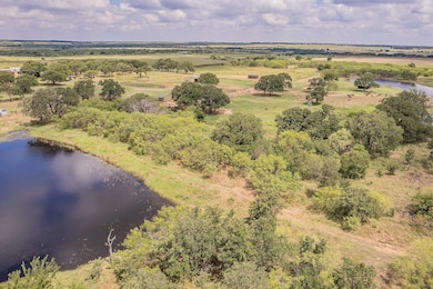 Drone / aerial view with a rural view and a water 