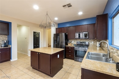 Kitchen featuring stainless steel appliances and k