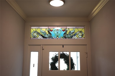 Elegant Stained glass above front entry door