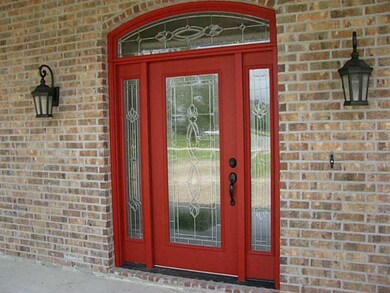 Exterior Front. Beautiful leaded glass door at fro