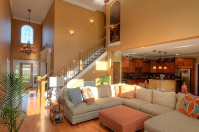 The den layout is exceptional for entertaining with the openness of the kitchen and morning room.  Floor to ceiling windows allow for beautiful natural lighting from day to night.