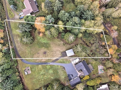 RV carport already there, as well as a 3-bedroom installed septic system and a shared well with the neighbor. It's READY!