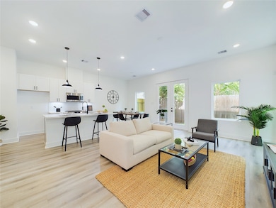 Open concept kitchen, dining, and living - ideal f