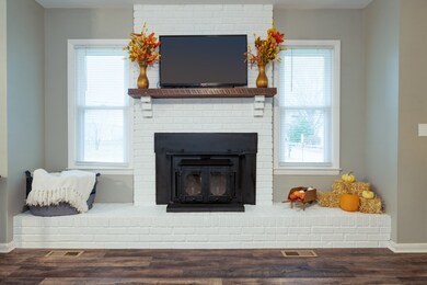 Beautiful fireplace centers this room