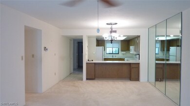 Dining area adjacent to living room.  Breakfast ba