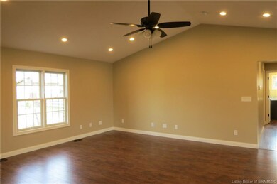 LIVING ROOM OFFERS VAULTED CEILING, RECESSED LIGHT