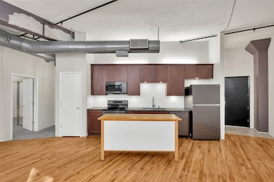 Butcher Block Island will remain with the home. Pe