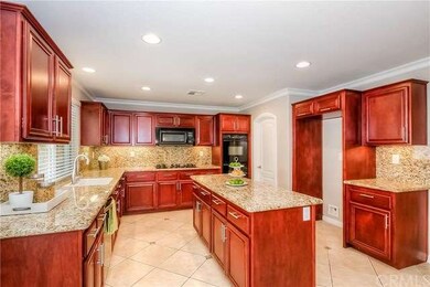 Upgraded gourmet kitchen has plenty of cabinets, w