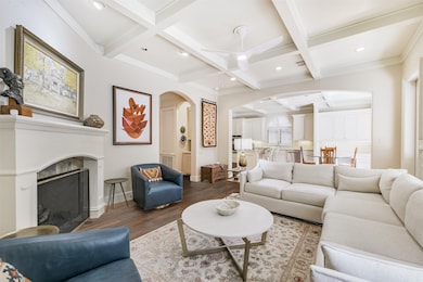 Living area opens seamlessly to kitchen and breakfast. Virtually renovated floors