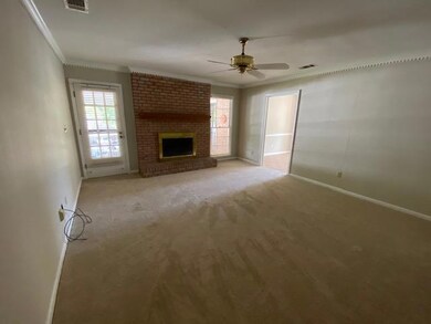DEN WITH FIREPLACE AND HEARTH