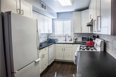 Bright Kitchen with newer self-closing drawers and Lazy Susan. All appliances are included!
