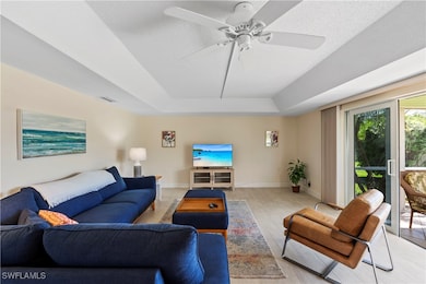 Living area with tray ceiling.