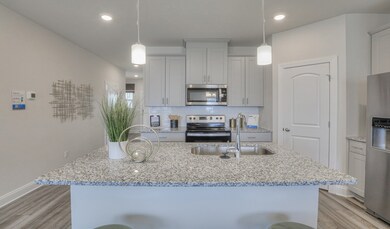 Photo is not of the actual home, but is an inspirational photo of builder’s model home and may depict options, furnishings, and/or decorator features that are not included