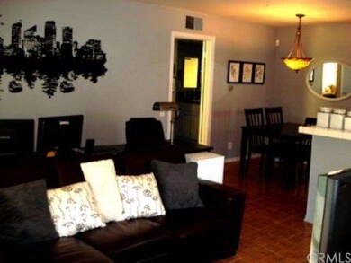 Spacious Living Room opens Kitchen and Dining Area