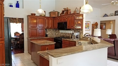 Upgraded kitchen with easy access to family room,
