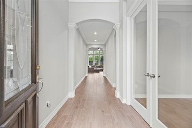 As you step into the foyer, you're immediately gre