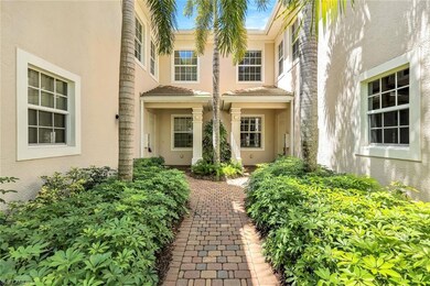 Property entrance featuring stucco siding