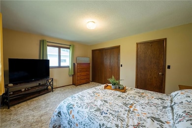 Large cedar lined closet completes this Master Bed