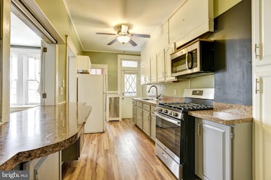 1712 E 32nd St, Baltimore, MD 21218 - photo 5