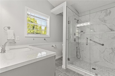 Newly renovated and updated primary bath featuring