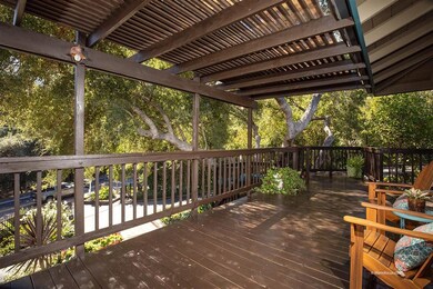 newly rebuilt front deck with beautiful stained gl