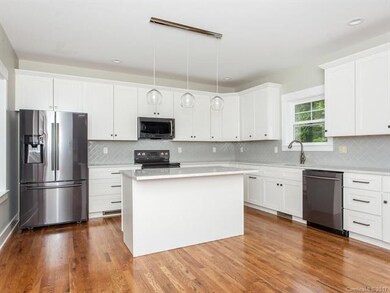 Clean & crisp kitchen with quality wood cabinetry 