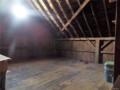 The unfinished attic could become added living space.