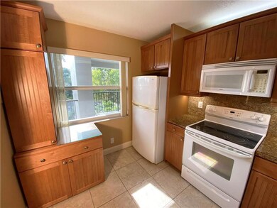 Thomasville cabinets offer tons of storage in this