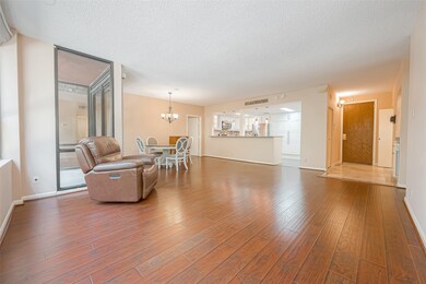 The living room is seamlessly connected to the bre