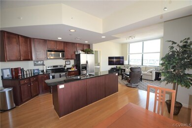 Kitchen has eat-in island, great counter space and
