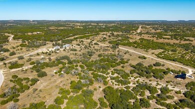 Aerial view of property's location with rural landscape