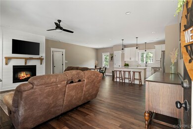 Living room featuring plenty of natural light, cei