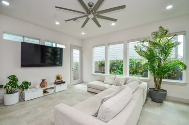 This spacious living area boasts an abundance of n