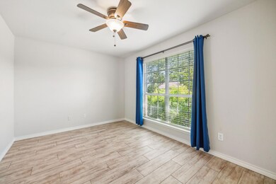 Spare room with light wood-type flooring, ceiling 