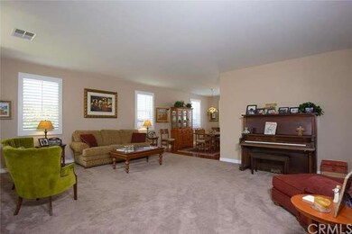A view of the expansive formal living room and Pla
