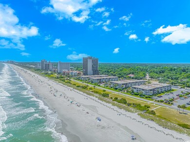 Bird's eye view with a beach view and a water view