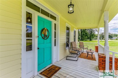 Freshly painted front door and porch