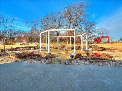 Firepit area in the back with professional landsca
