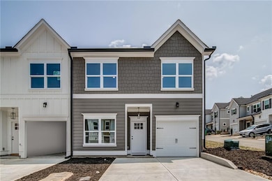 View of front of home featuring an attached garage