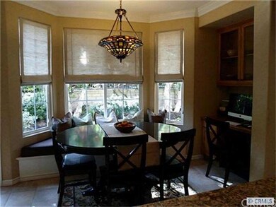 Dining Area with Window Seat in Kitchen and Built 