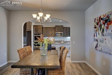 Dining space featuring light hardwood / wood-style