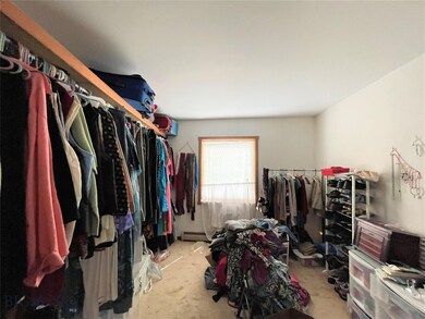 One of the upstairs unit's bedrooms