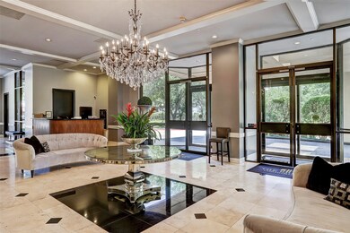 Foyer of the building is dripping in marble and go