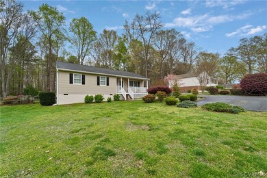 Ranch-style house with a front yard