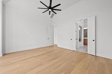 Unfurnished bedroom with light wood-type flooring