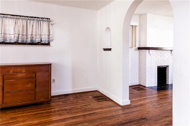 Arched openings add a touch of architectural character to this opening between rooms.