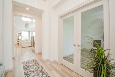 From the main entrance, this is the exquisite view that greets guests, straight through to the fantastic living area.