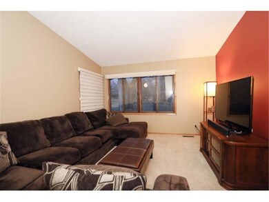Living room has lots of seating for watching those