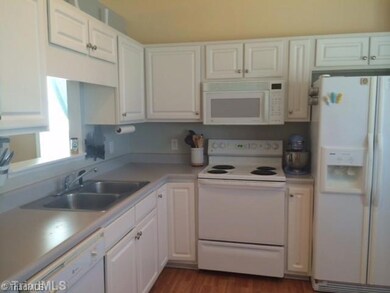 Kitchen. Kitchen includes disposal, slide-in oven range, built-in microwave and pantry!