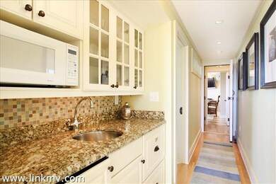 kitchen looking down to the second bedroom